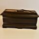 Vintage carved wooden box of a mountain landscape in relief