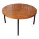 Round coffee table in walnut veneer and metal