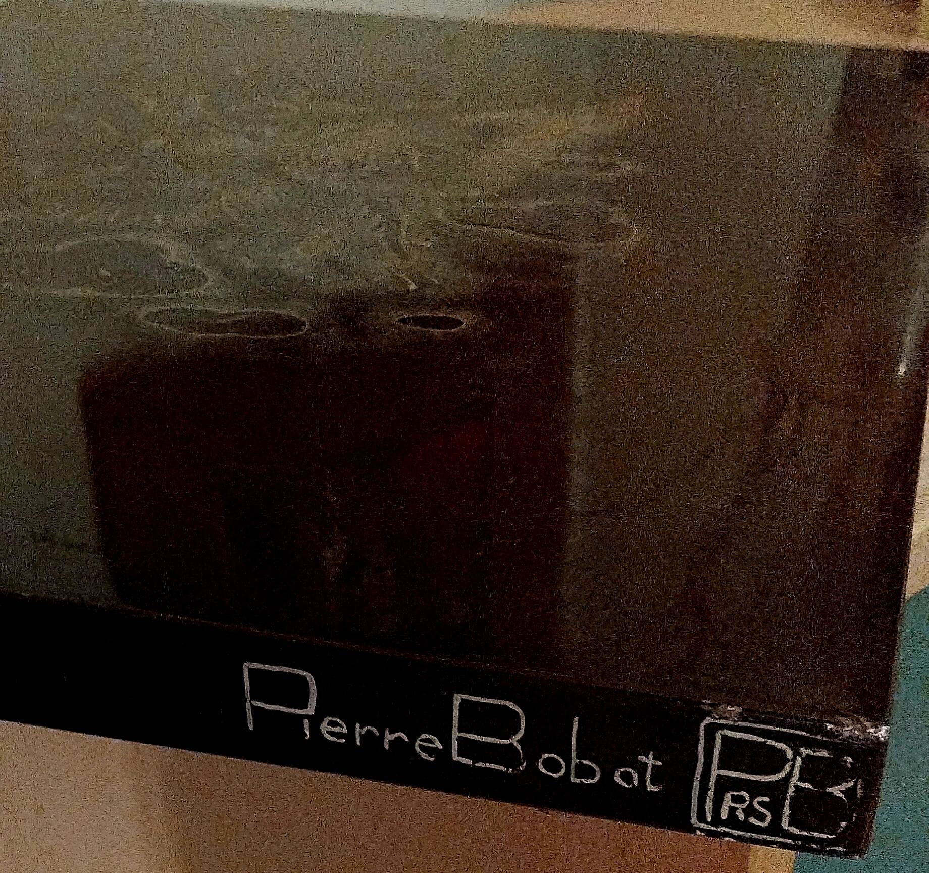 Two panels in lacquer and gold by Pierre Bobot.