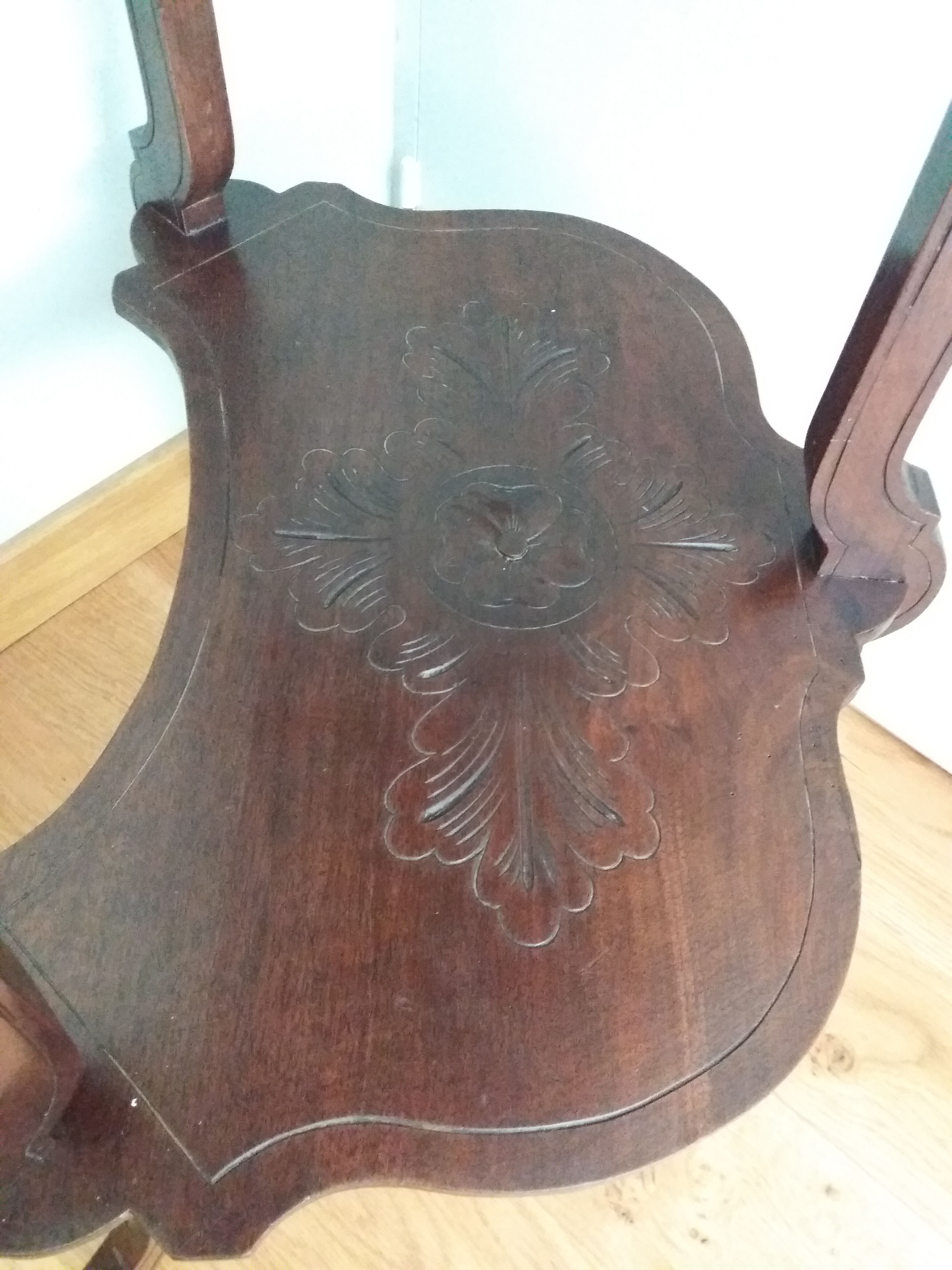 Triplet console harness in carved wood