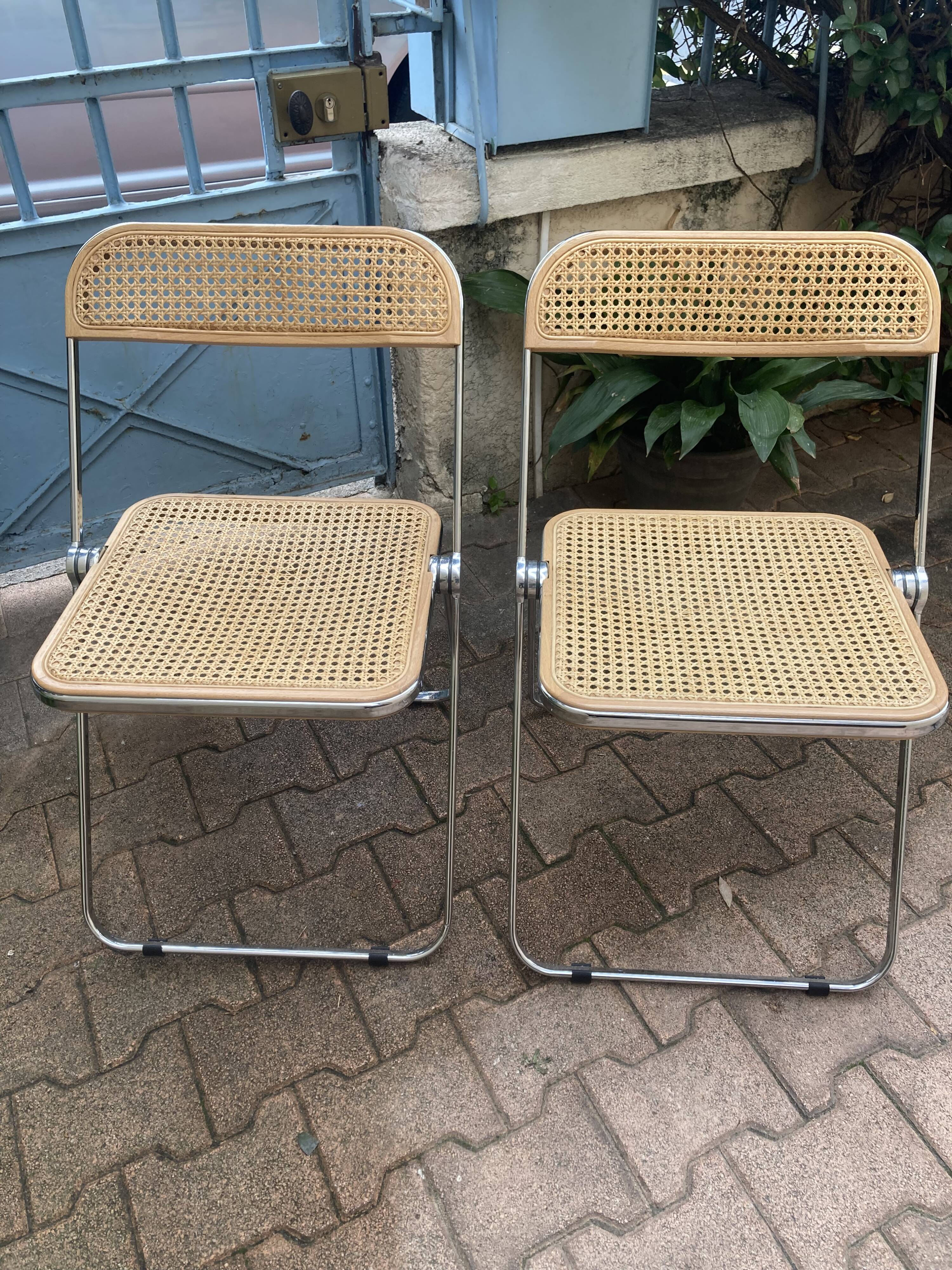 Plia chairs by Castelli in wood and cane.