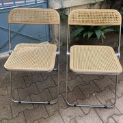 Plia chairs by Castelli in wood and cane.
