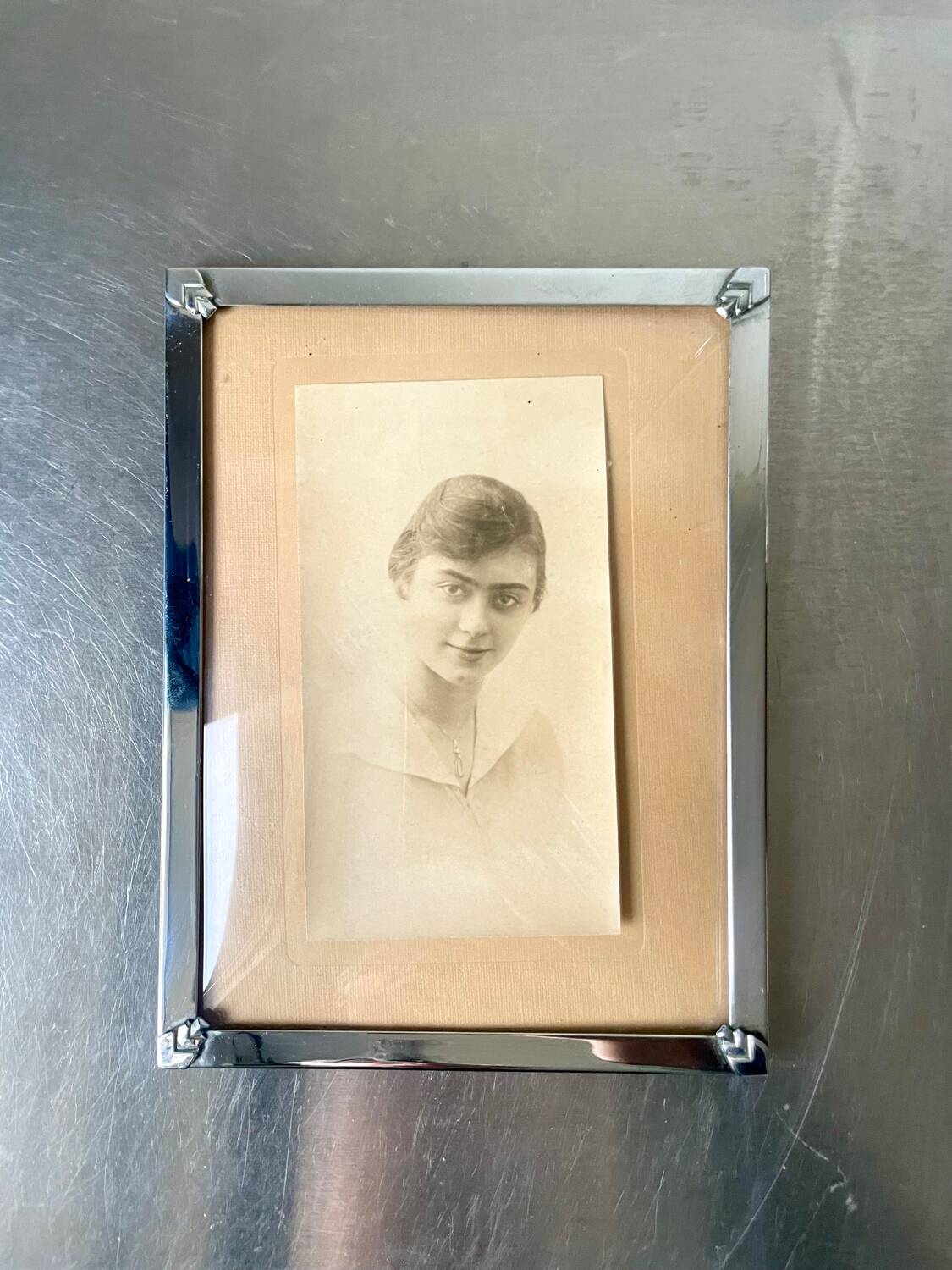 Art deco silver colored  metal frame  20.5  cm x 15.5 cm convex glass