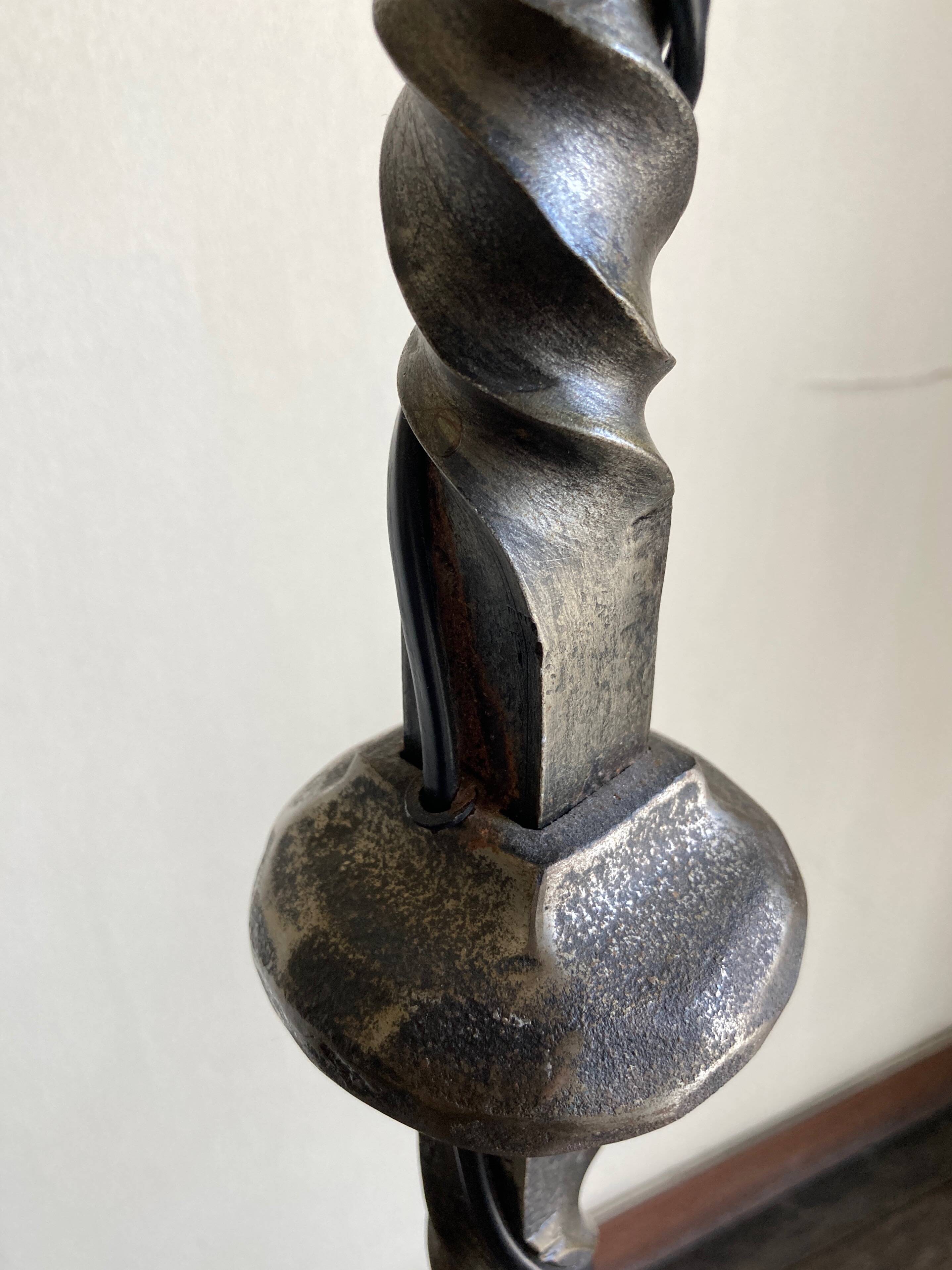 Floor lamp in beaten iron and bronze Artisans de Marolles 1960
