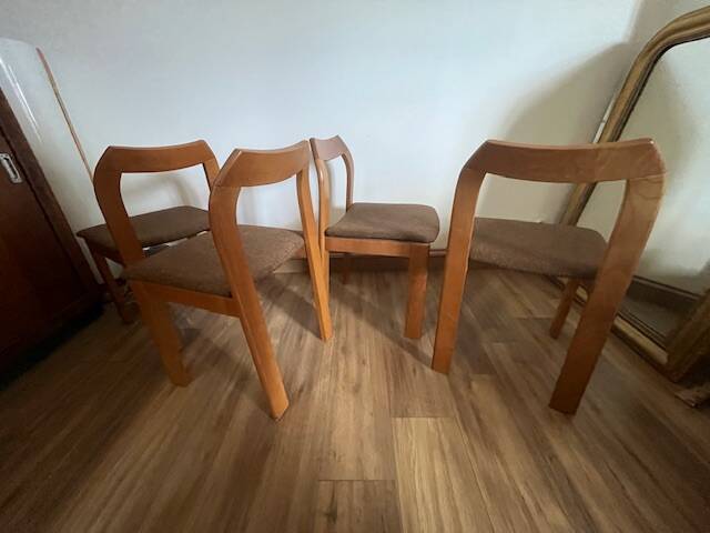 4 brown chairs