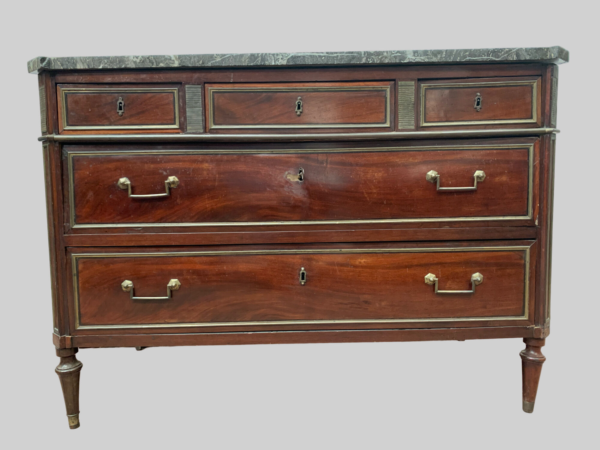 Commode style Lois XVI in mahogany Top of veined gray marble XIX century