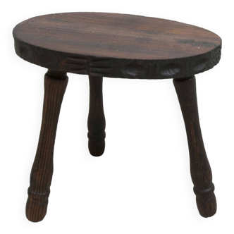 Low brutalist solid wood stool 1950