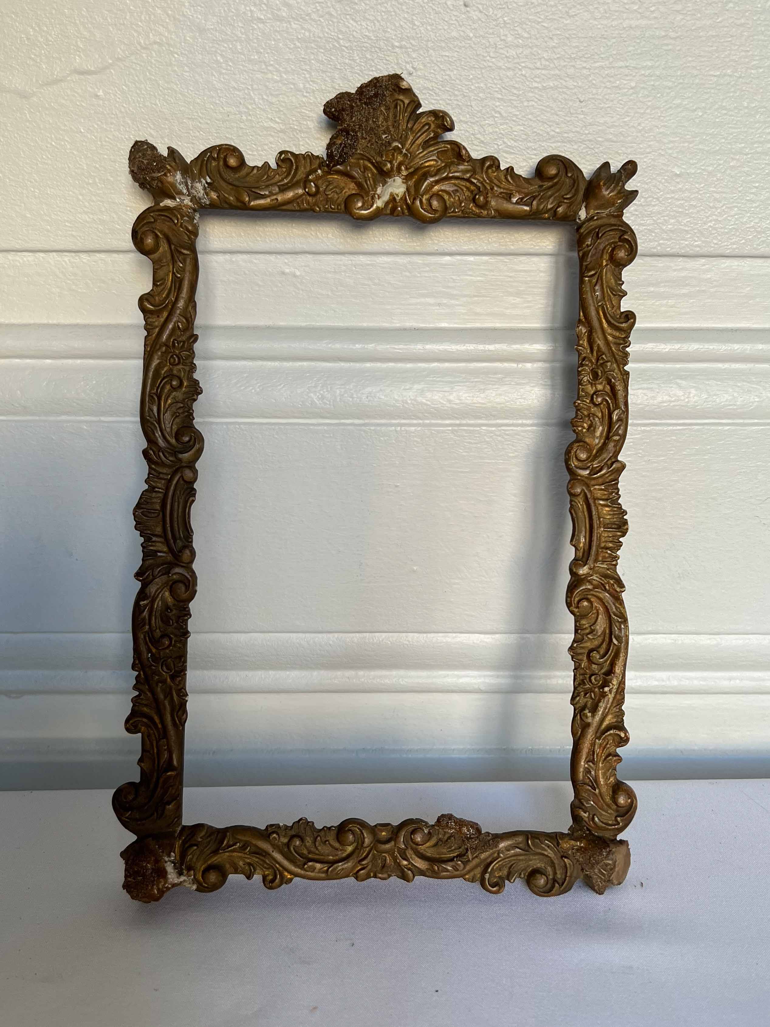 Frame with moldings to restore
