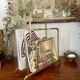 Designer brass magazine rack