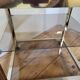 Gold metal and smoked glass serving trolley
