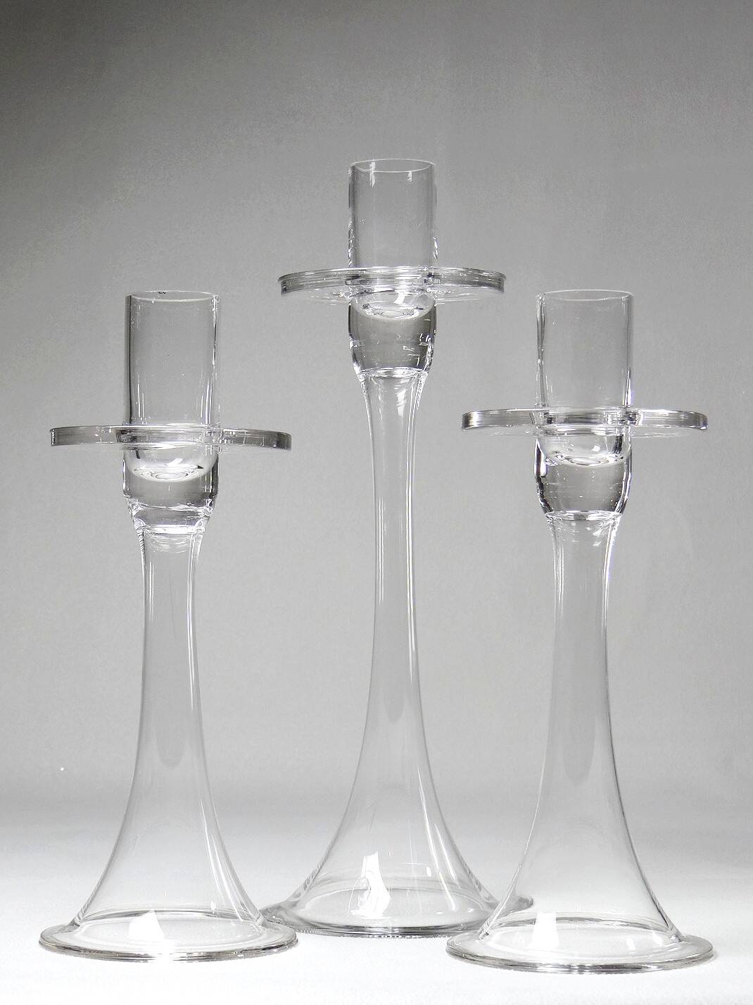 Trois bougeoirs en cristal vintage