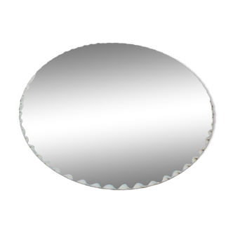 Miroir rond non encadré contour ondulé biseauté
