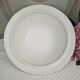 Antique deep plates in ironstone with a soup tureen.