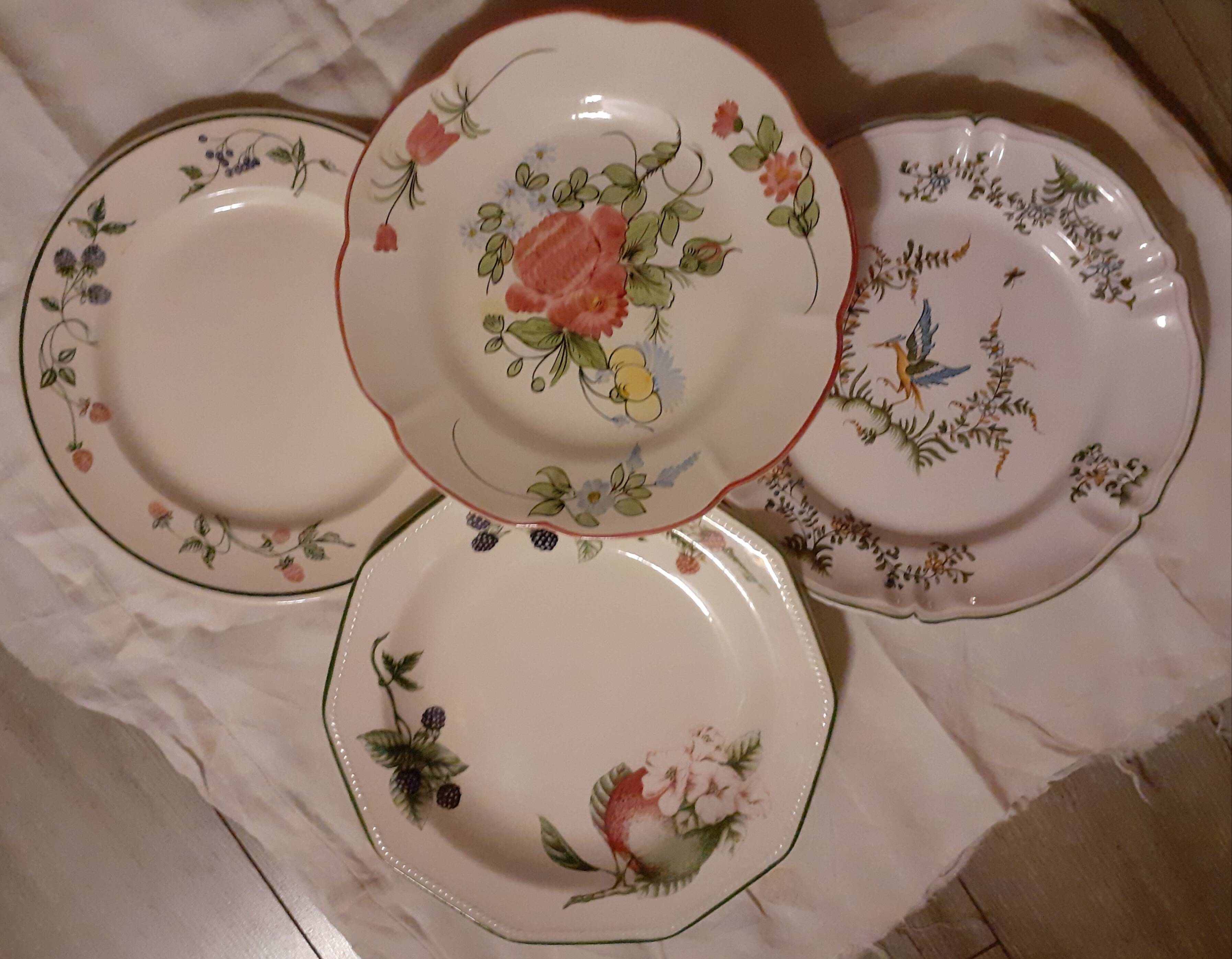 Set of four retro fruit and flower flat plates from Moustiers...