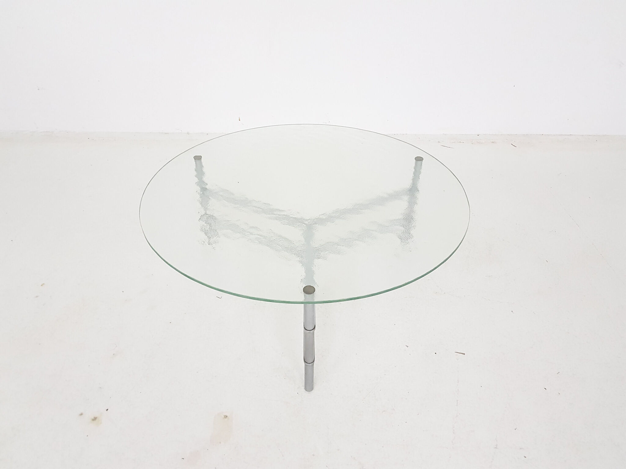 Mid-century round glass and chrome coffee table