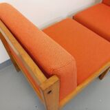 Set of 2 vintage Baumann armchairs in orange fabric and wood from the 80s