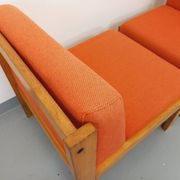 Set of 2 vintage Baumann armchairs in orange fabric and wood from the 80s