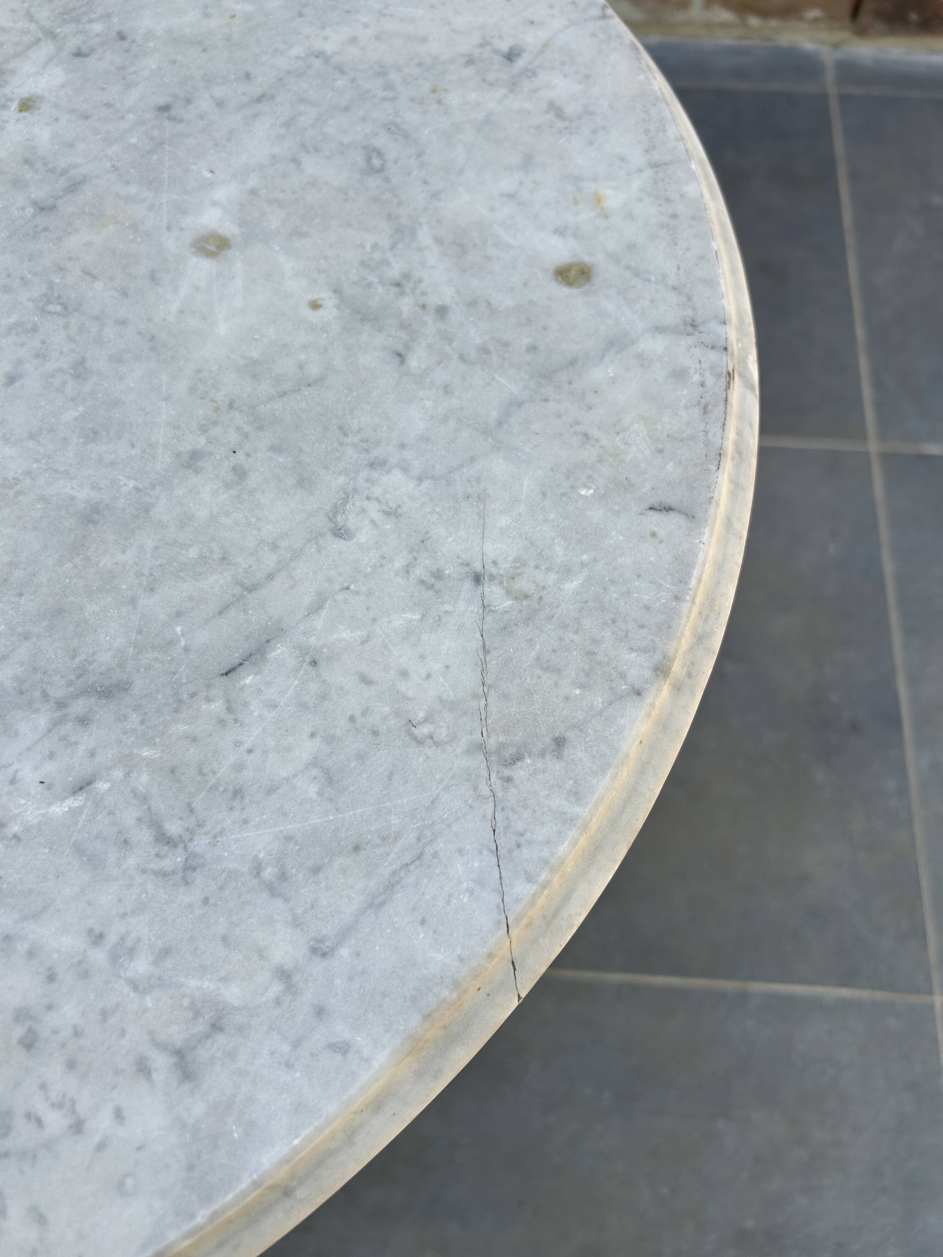 Bistro table in cast iron and marble from the art nouveau period.
