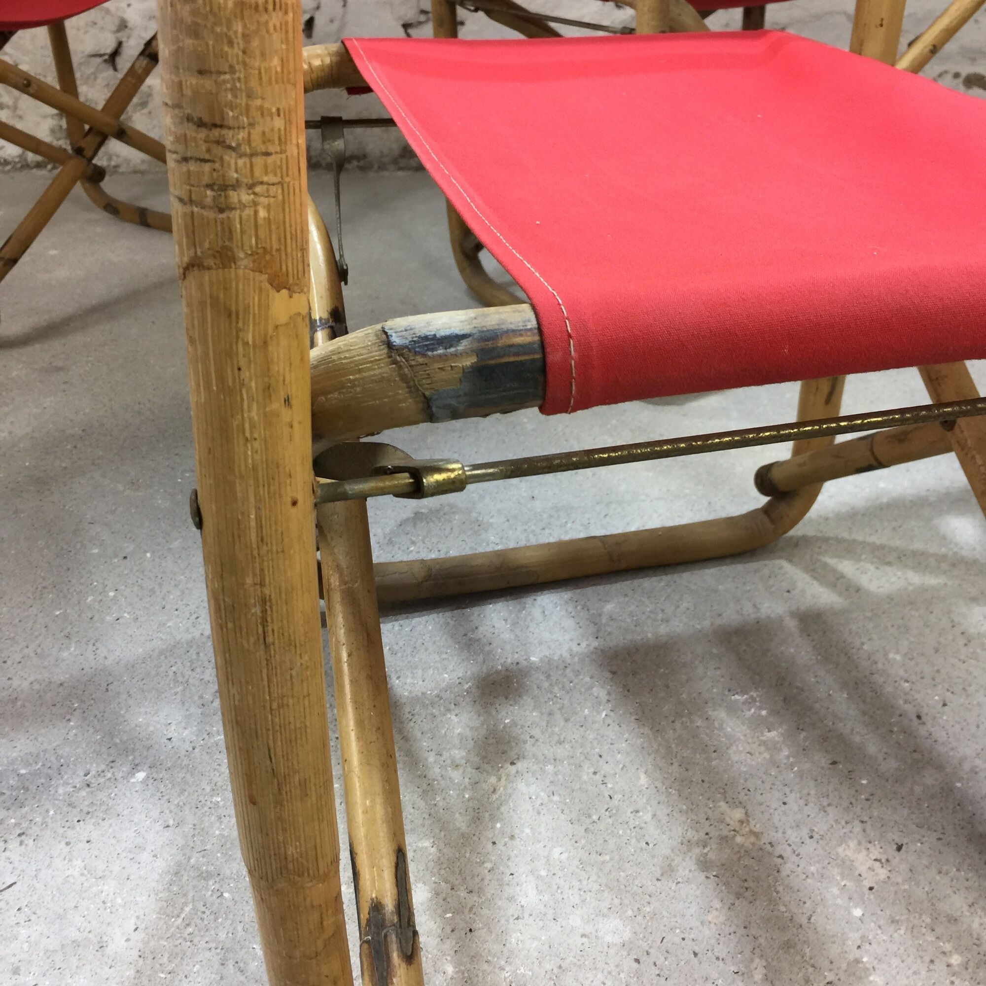 Lot of 4 chairs in rattan and red fabric, folding, 1960s