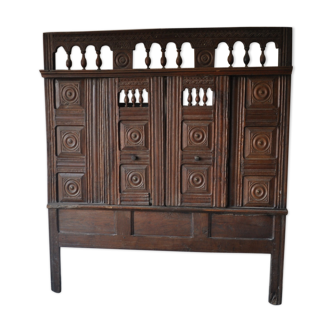 Old enclosed bed door
