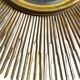 Large sunburst mirror with beveled glass and gilded wood from around 2010.