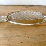 Transparent glass raviers in the shape of a fish