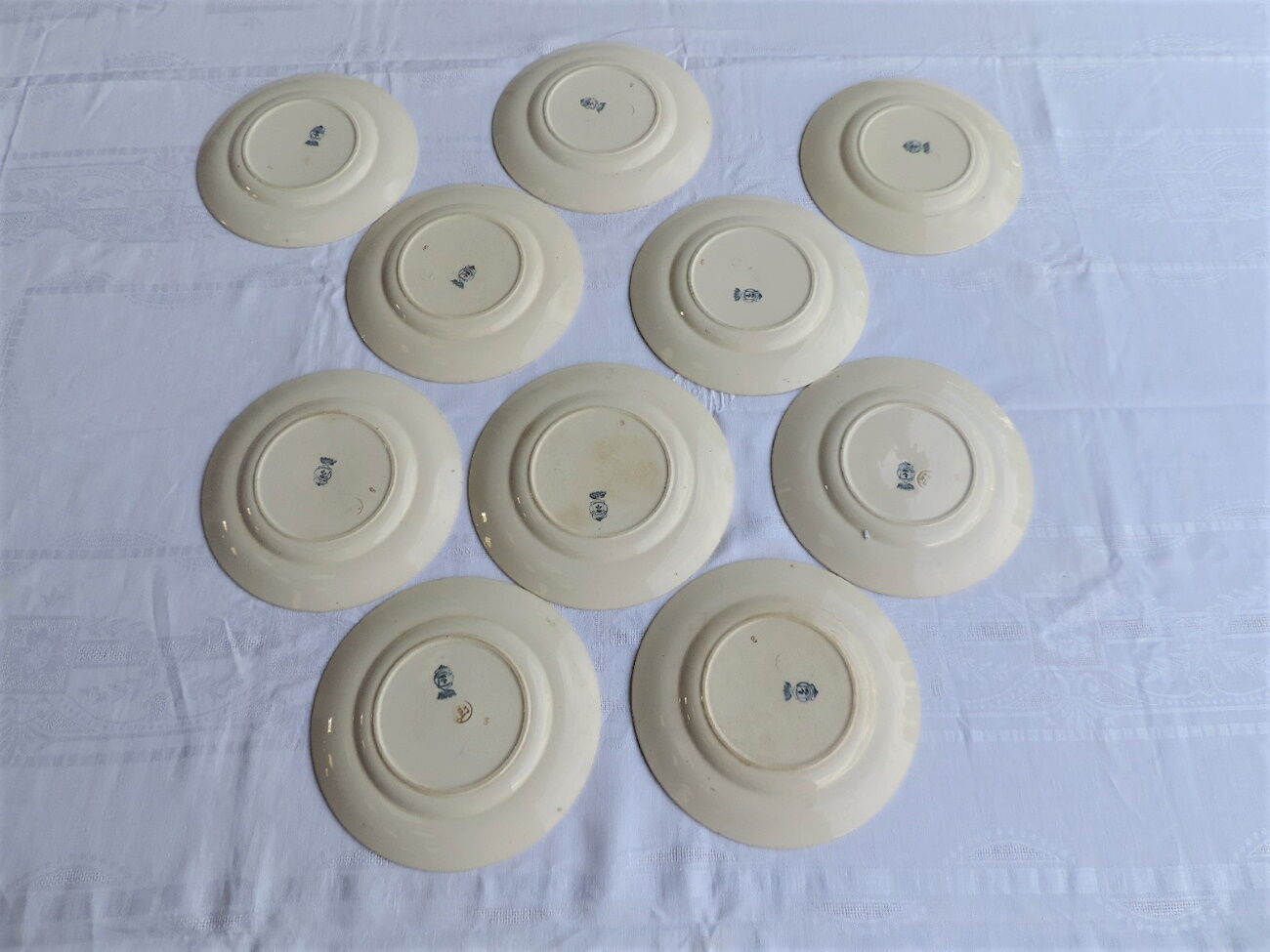 Lot de dix assiettes en Longwy , décor Botanique