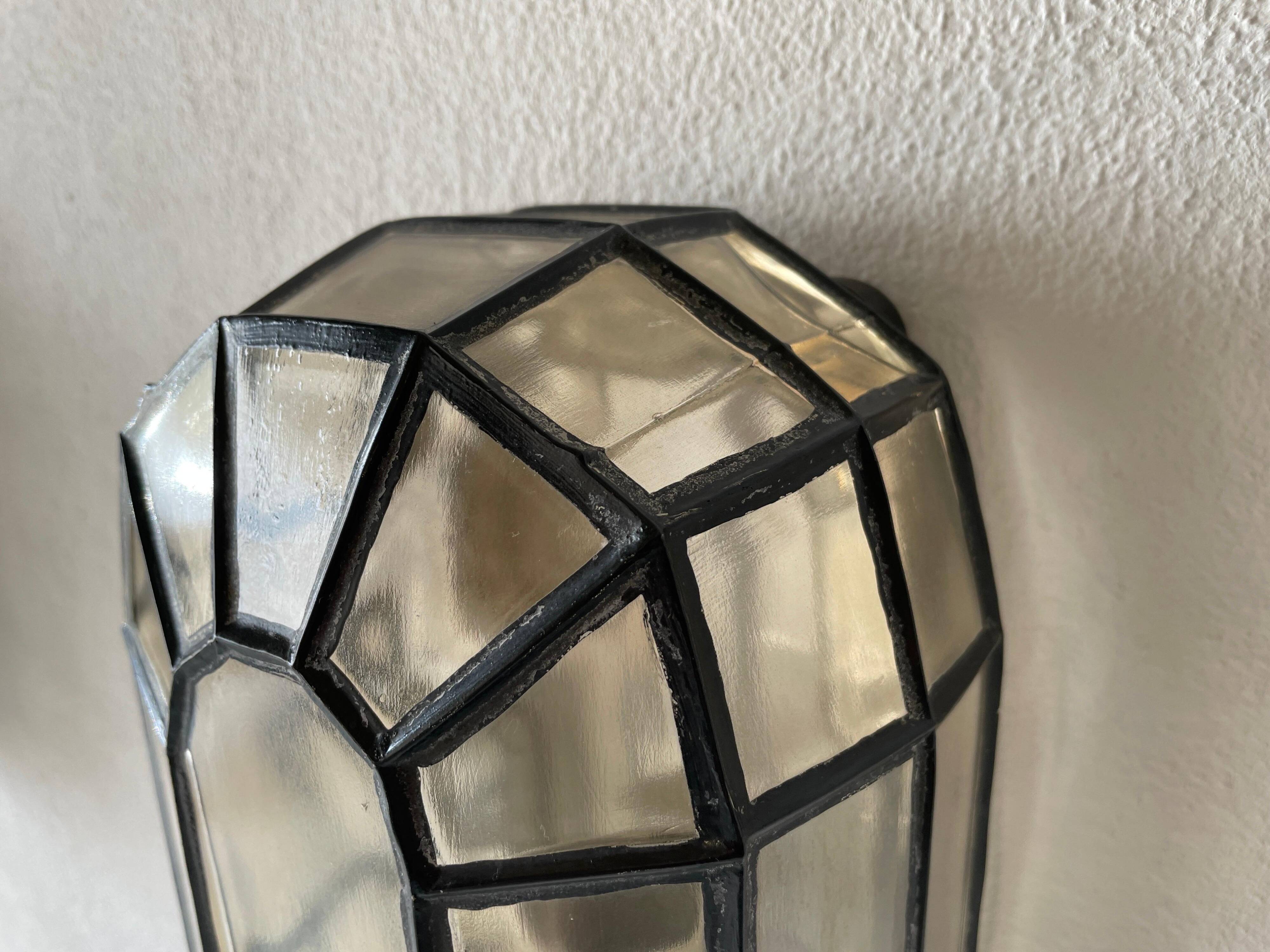 Pair of black iron wall sconces with structured glass by Limburg, 1960s, Germany.