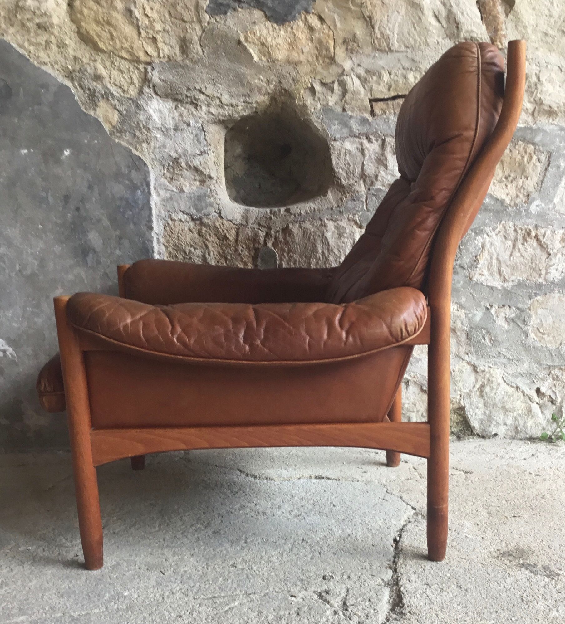 Scandinavian armchair in teak and leather - 1960