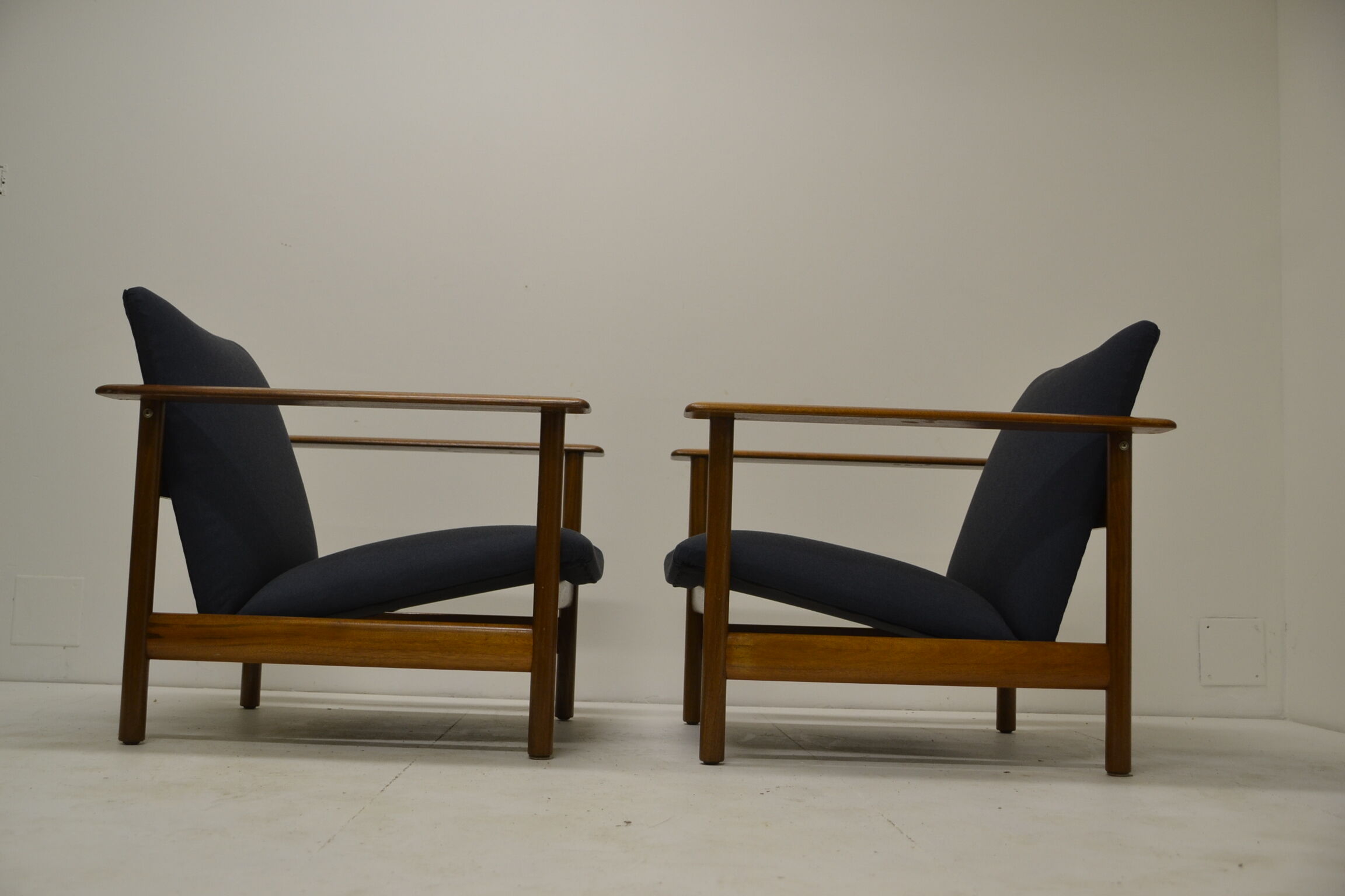 Pair of chairs of Gilbert Steiner mahogany and blue fabrics