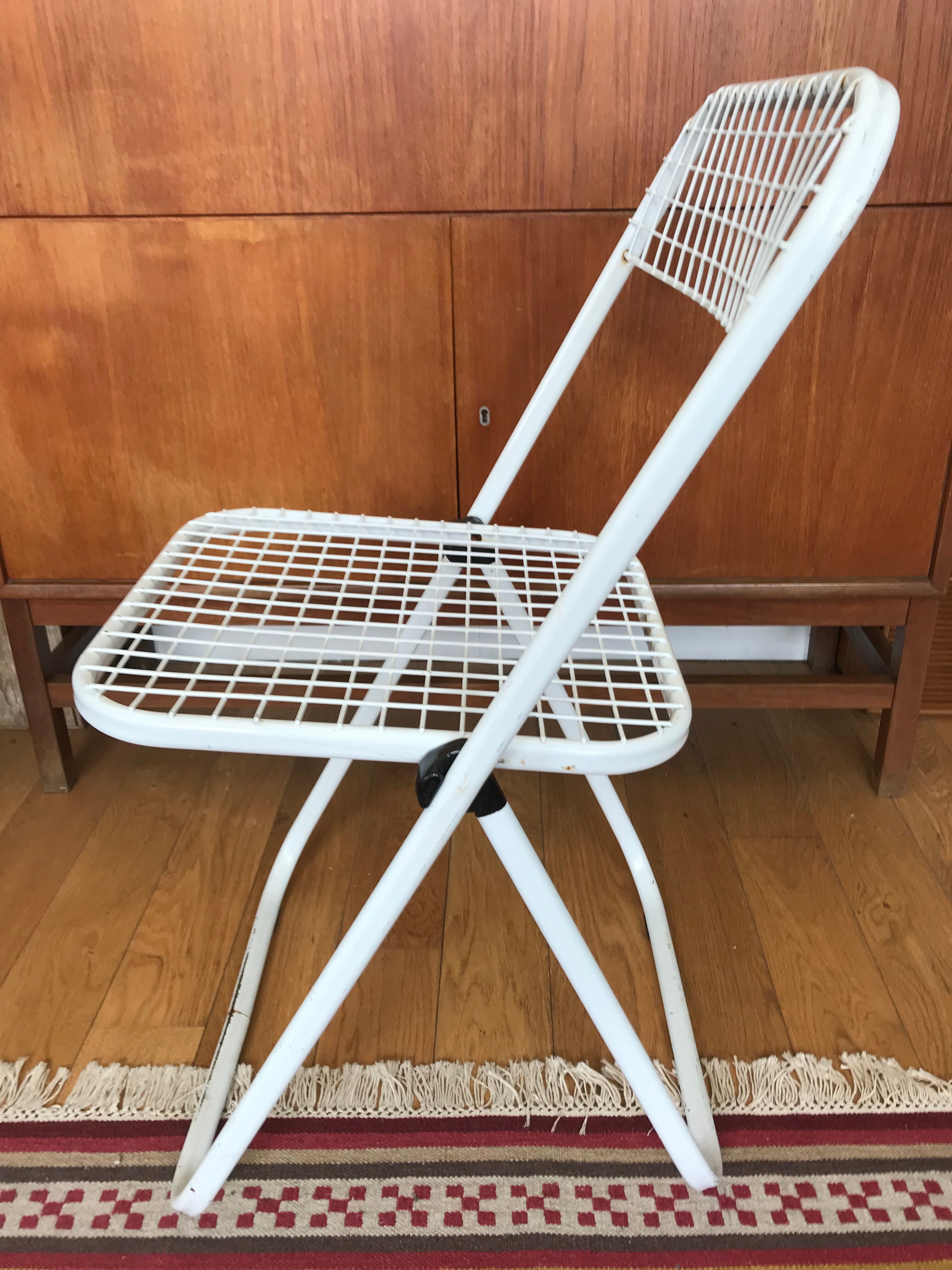 Metal folding chair by Talin Editions