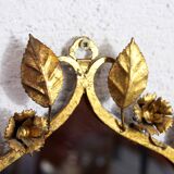 Old candlestick mirror gilded with leaf