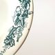 Set of nine deep plates in Givors earthenware, "Floreal" model.