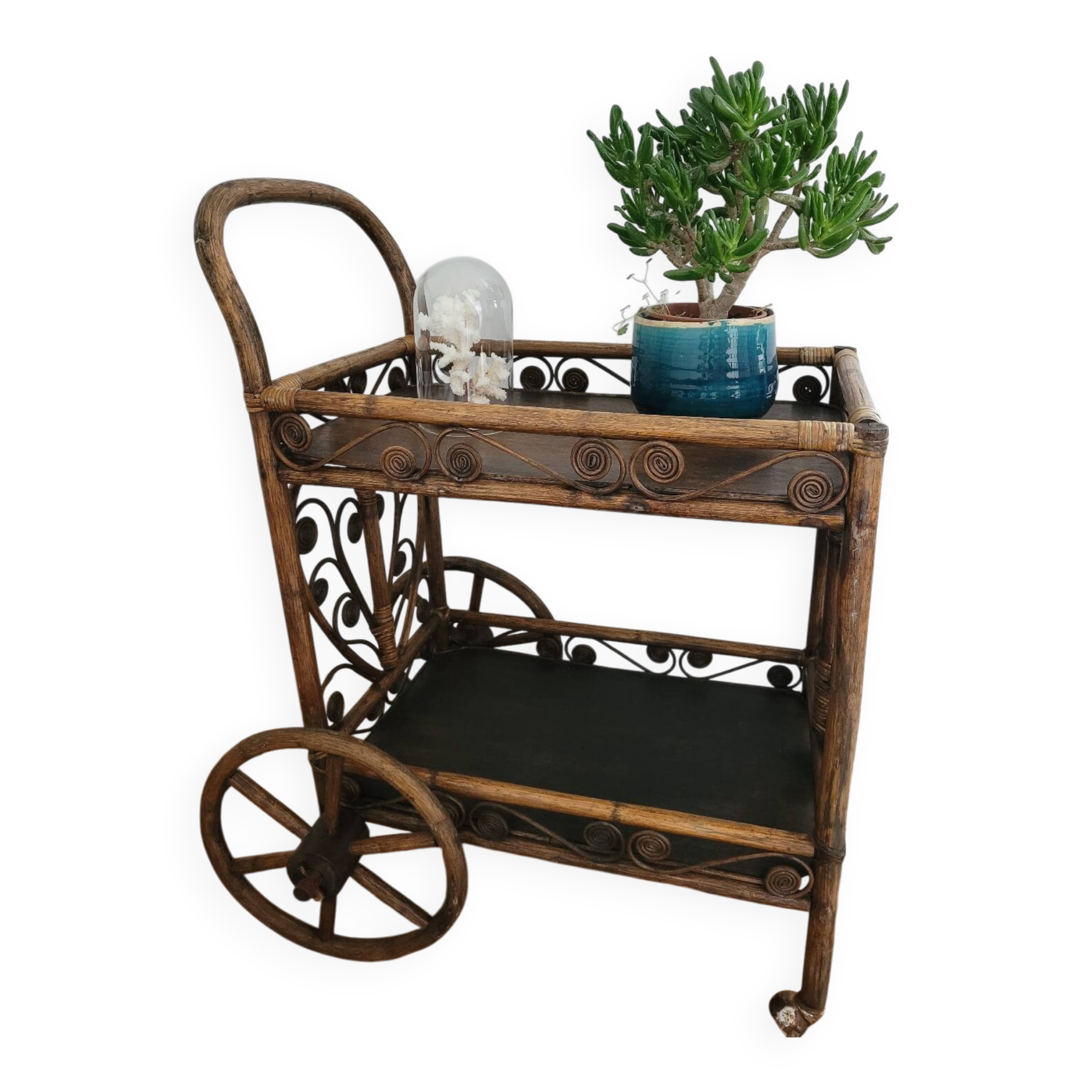 Bamboo and rattan dessert table in peacock style.