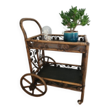 Bamboo and rattan dessert table in peacock style.