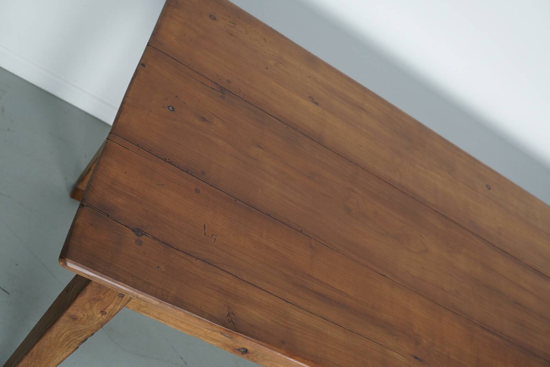 Rustic dining table in fruitwood from the early 20th century