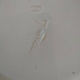 Two Longchamp earthenware plates.