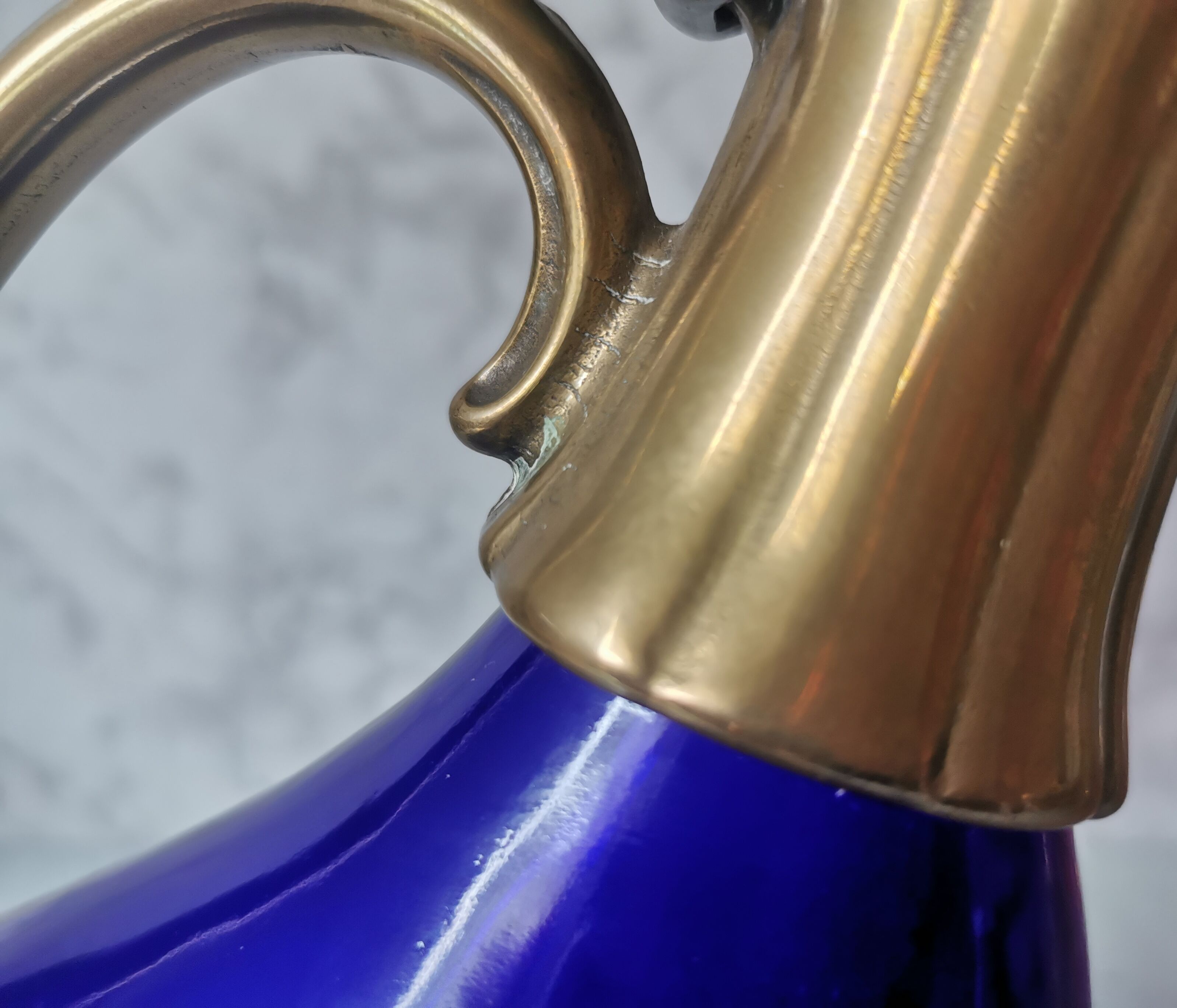 Glass and brass decanter
