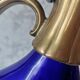 Glass and brass decanter