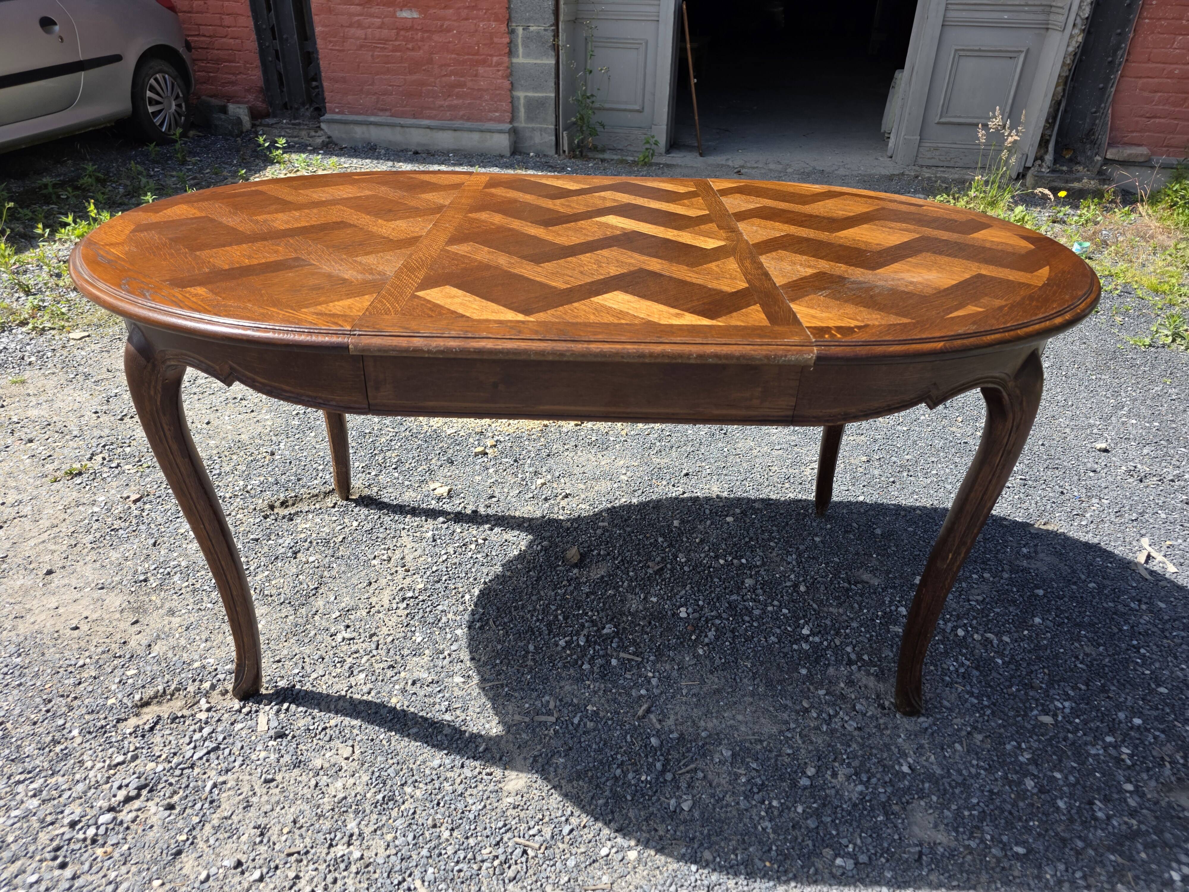 Extendable table in Louis XV style in oak (2 extensions)