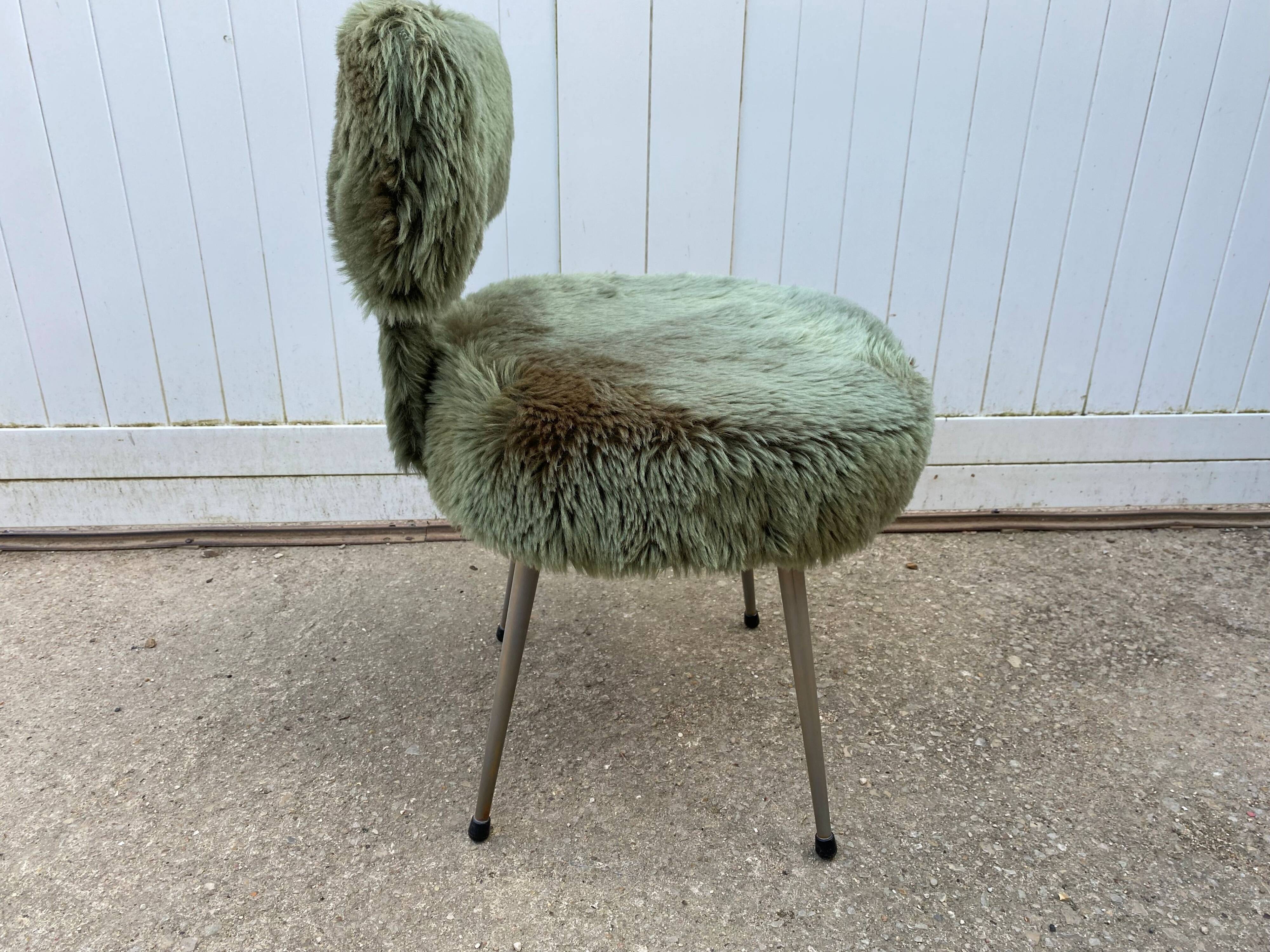 Vintage green furry chair from the 1960s