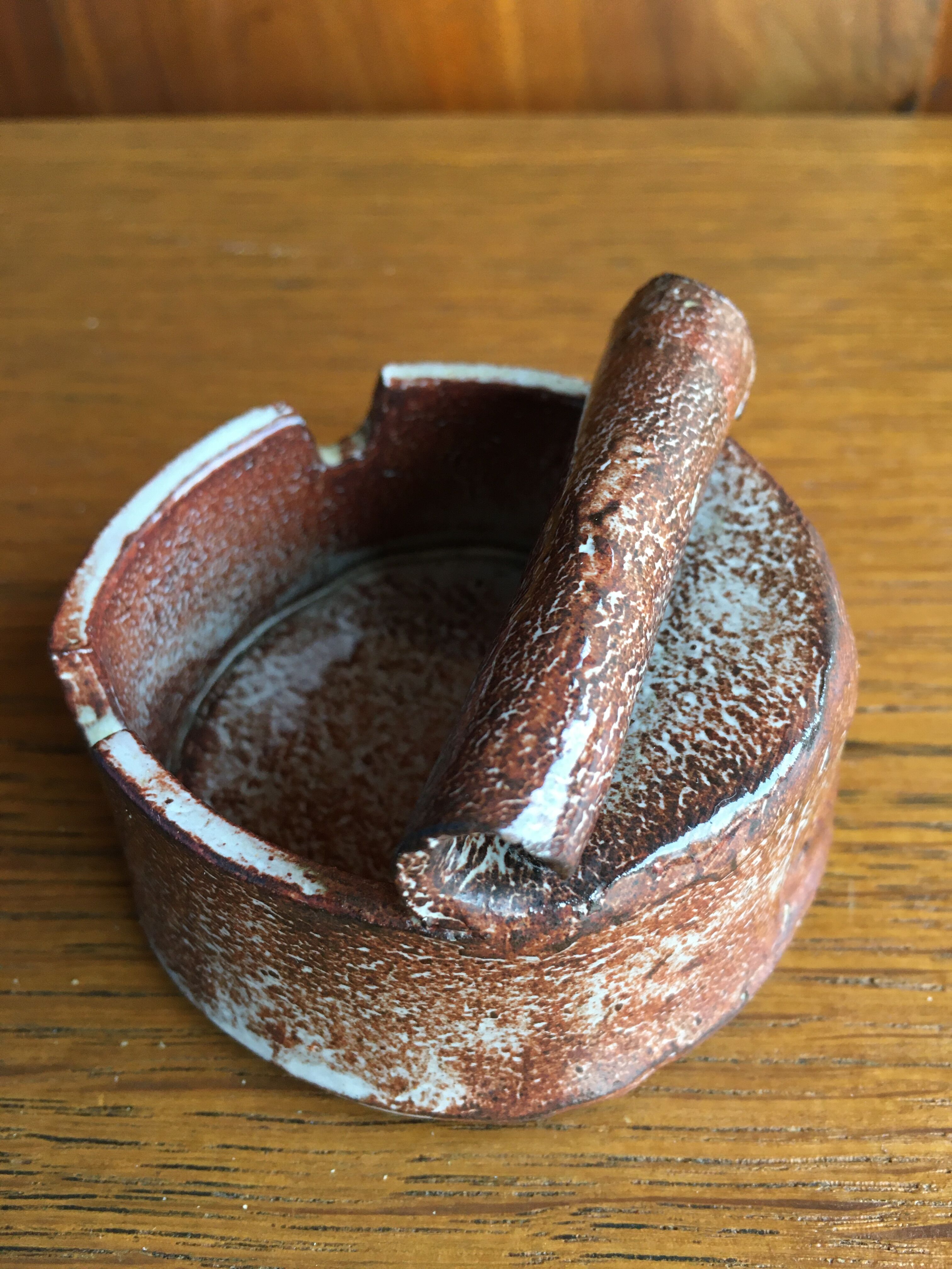 Enamelled terracotta ashtray