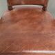 Set of 4 cognac-coloured cowleather dining chairs with decorative nails