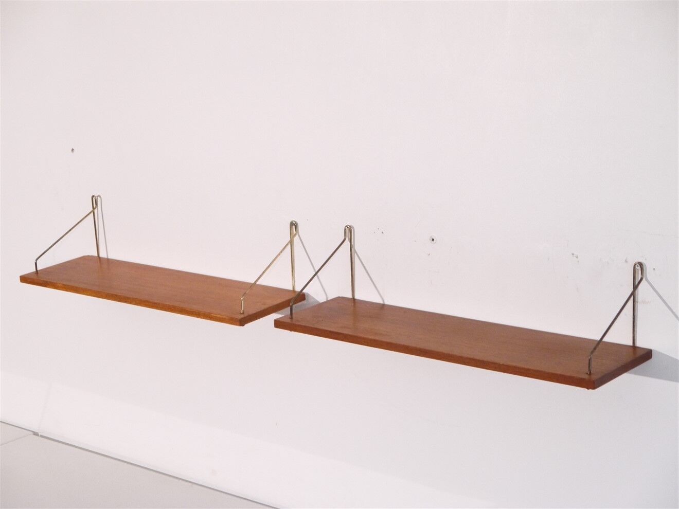 Pair of Danish teak and brass shelves 1960