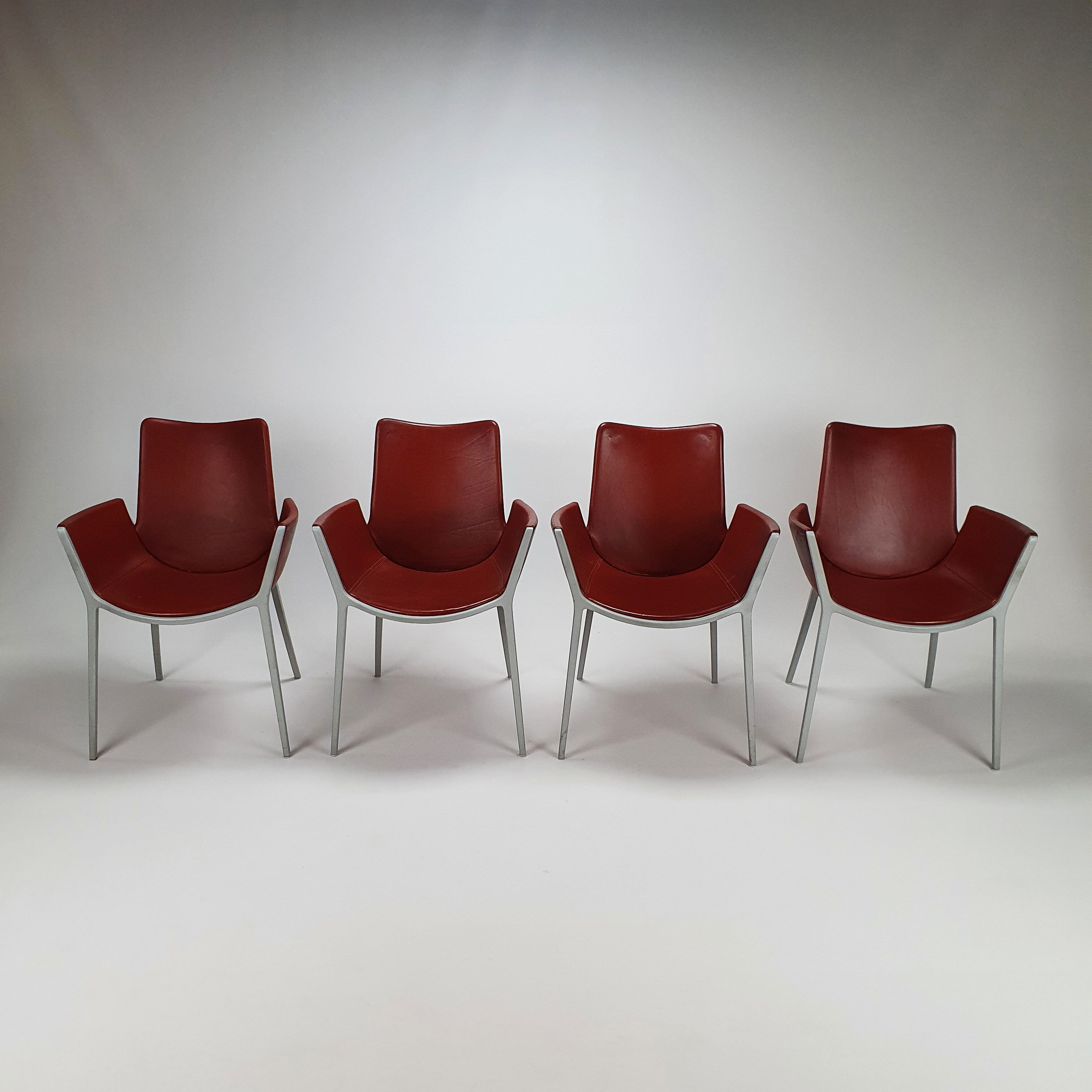 Set of 4 red leather and aluminium duna chairs by Jorge Pensi for Cassina, 1990s