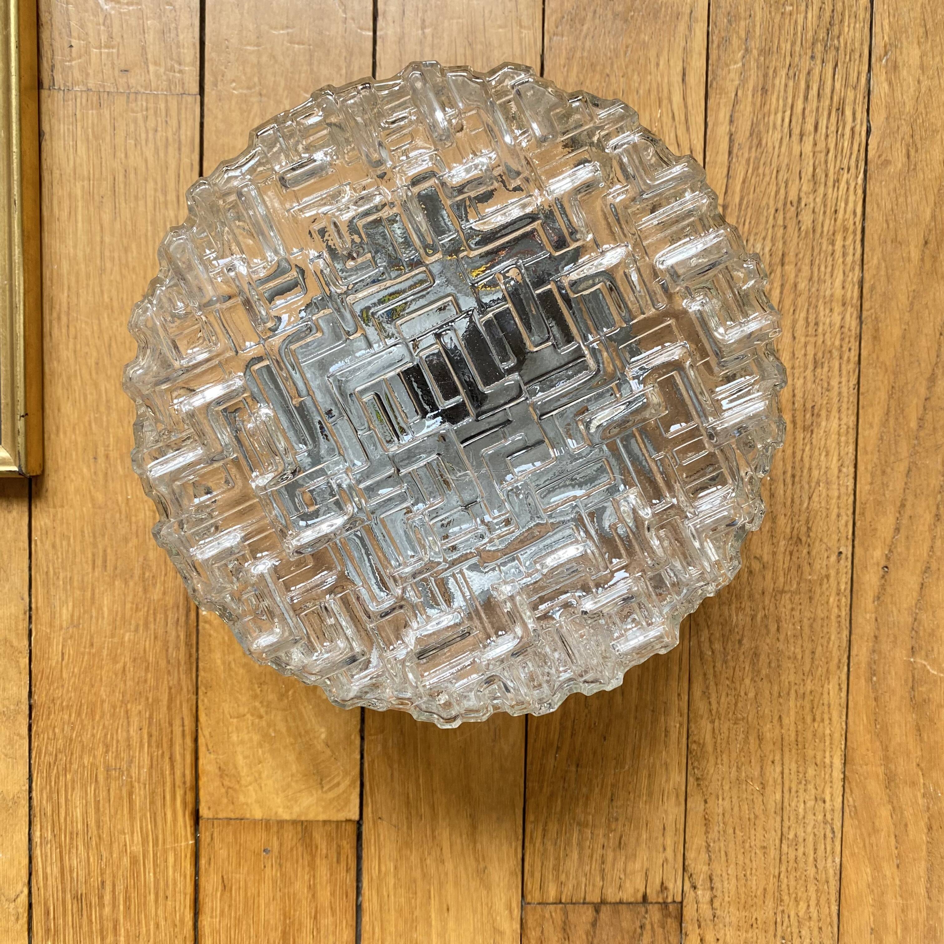 Wall lamp or ceiling light with minimalist porthole glass.