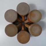 6 stoneware cups and saucers