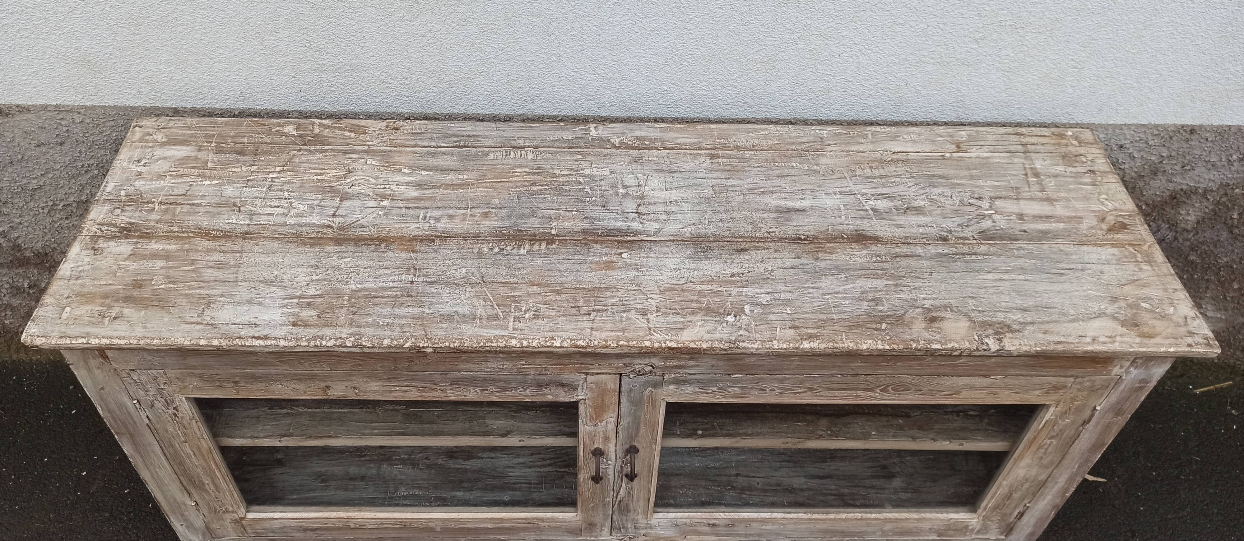 Glass sideboard in antique wood