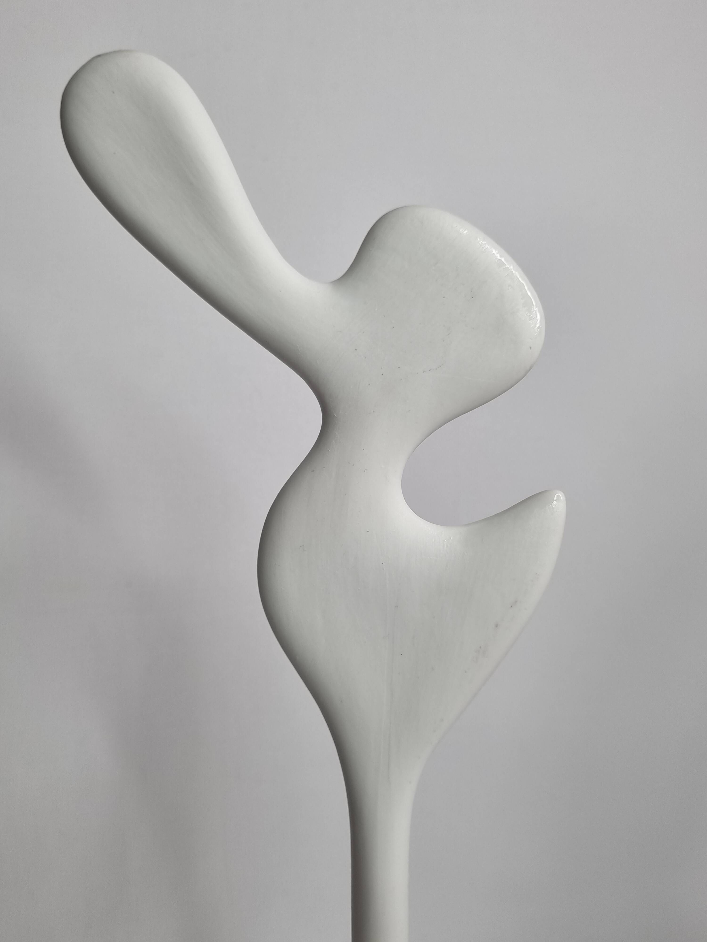 Biomorphic bisque sculpture, on turned wooden base, 37 cm