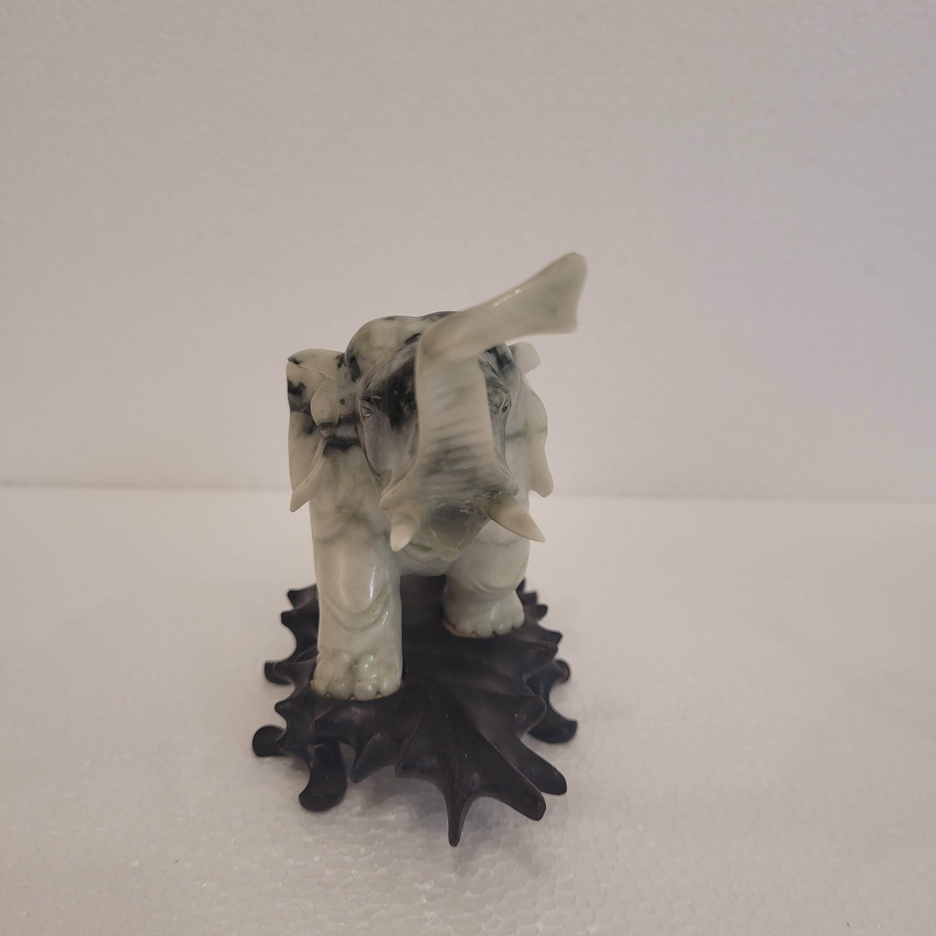 Pair of elephant paperweights, veined marble, 80s - France